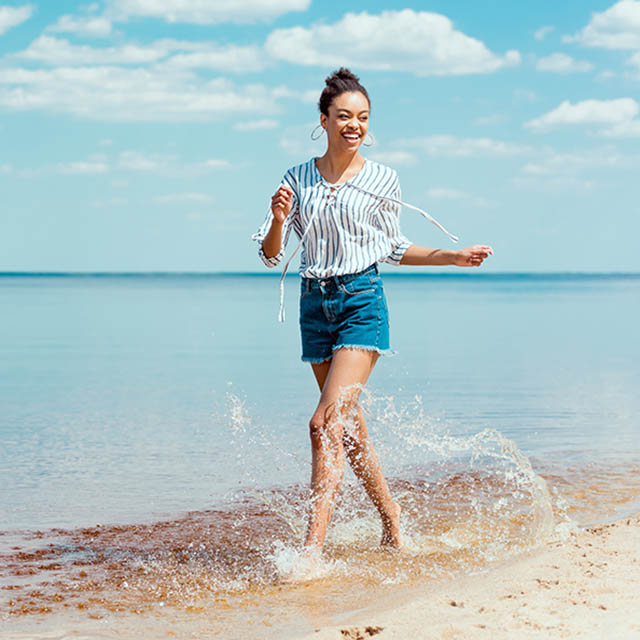 Smiling-African-American-Woman-Beach_640