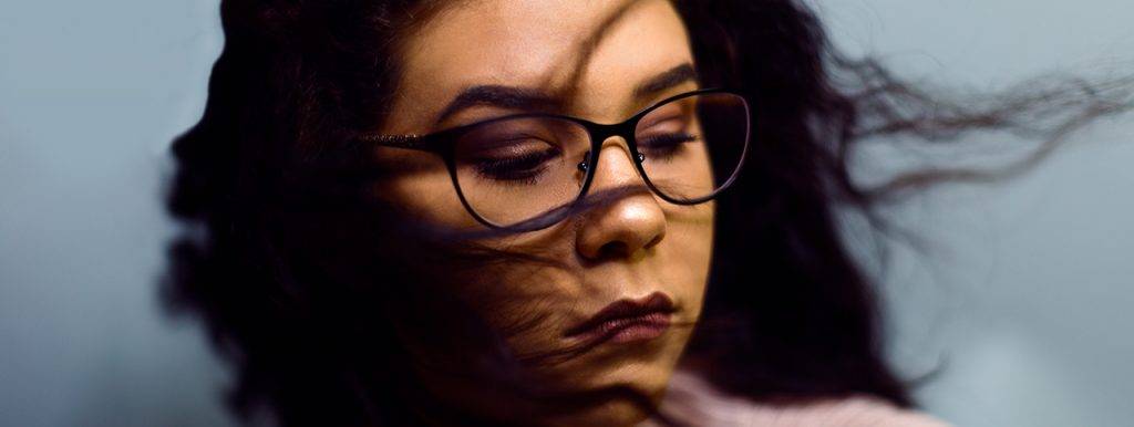 voilet_woman_hair_blowing-1024x386-1