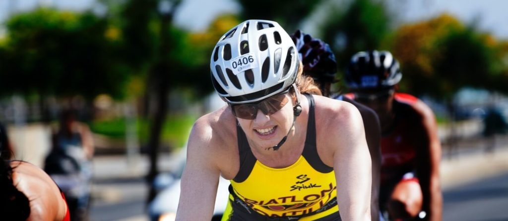 woman-cycling-wearing-sports-eyewear-1024x447-1